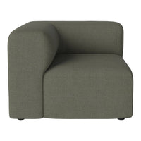 "Modern green corner sofa with a textured, fabric finish and minimalist design."