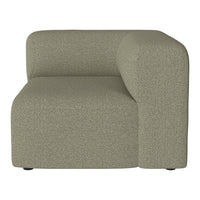 Taupe upholstered modular chair with a textured, soft fabric pattern, featuring a modern curved design.