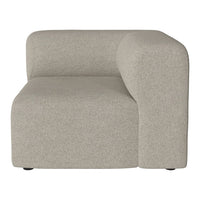 Beige curved sofa section with a smooth, minimalistic texture, perfect for modern interiors.