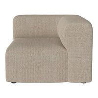 Beige textured upholstery with a subtle speckled pattern on a modern corner sofa segment.