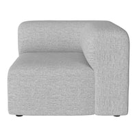 Gray textured corner sofa with a modern design, featuring a smooth finish and minimalist style.