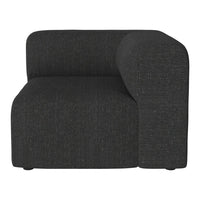 Dark gray upholstered corner sofa with a smooth, textured surface and contemporary design.