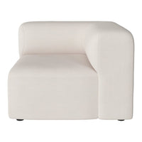 Cream upholstered modular sofa section with smooth, minimalist design and subtle texture. Perfect for modern interiors.