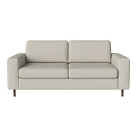 Light beige modern sofa with a minimalist design and smooth fabric upholstery. Simple square armrests and wooden legs.