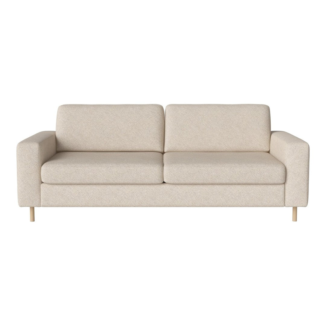Beige textured sofa with clean lines and light wooden legs, ideal for minimalist decor.