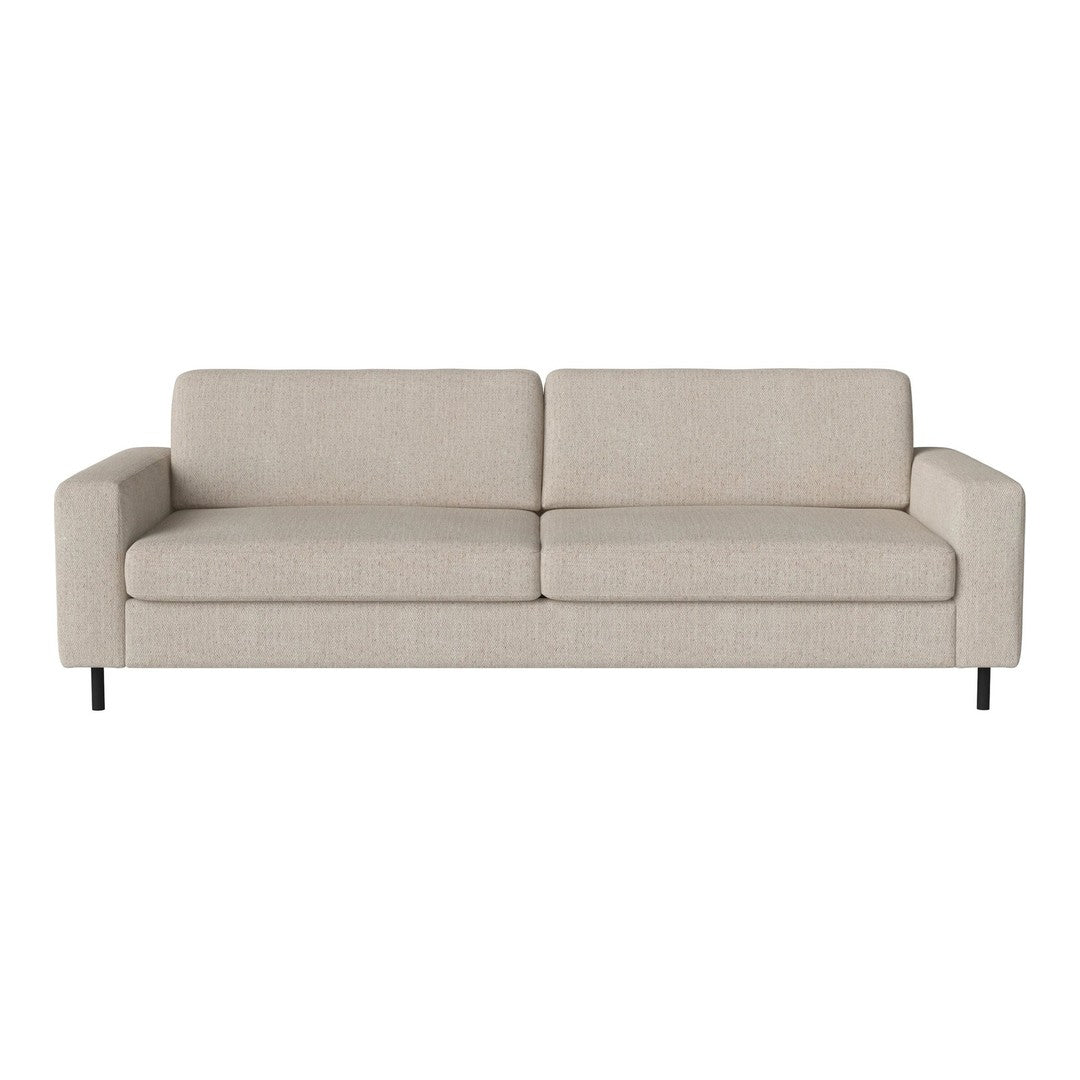 Light beige sofa with a smooth, textured fabric and minimalist design, featuring clean lines and no patterns.