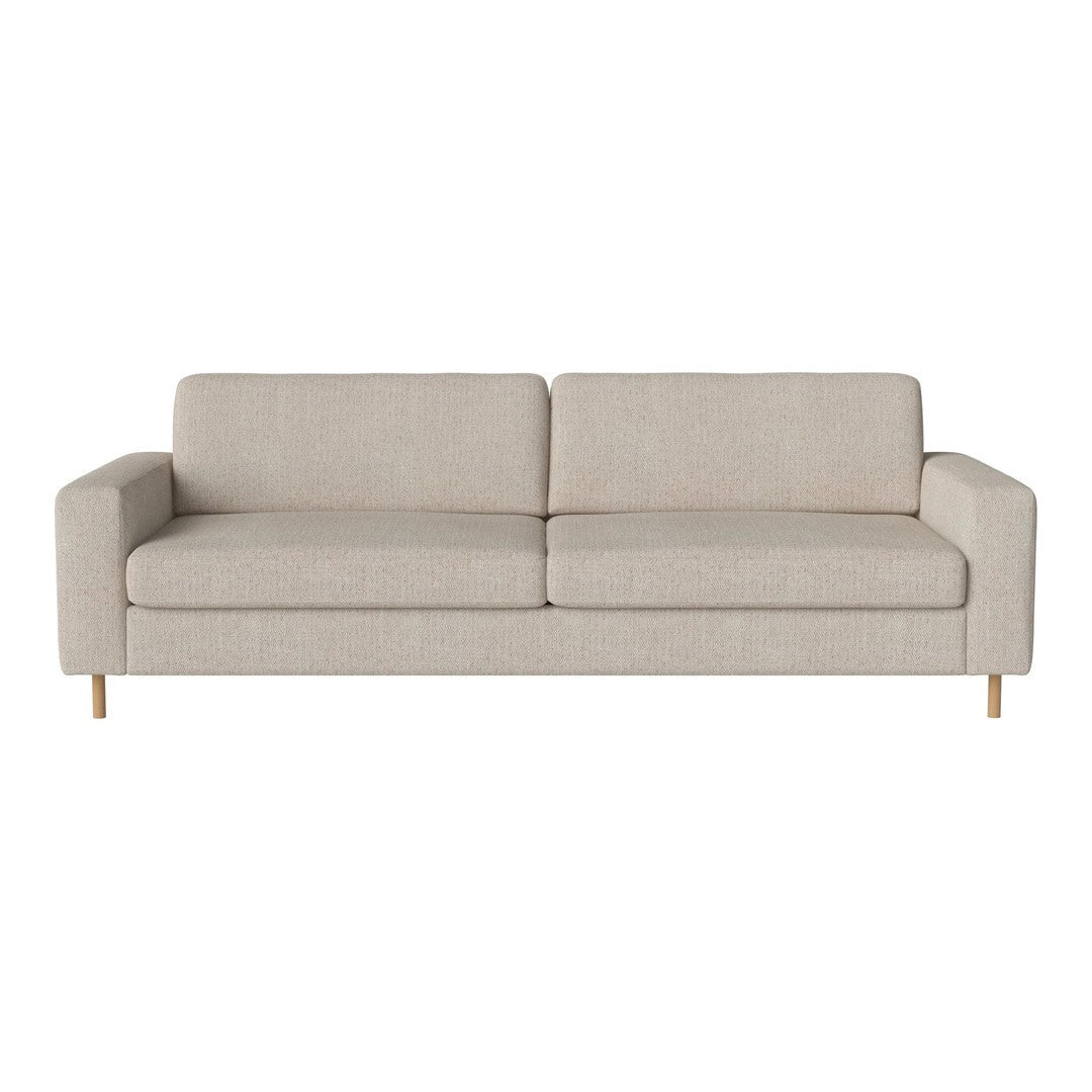Light beige fabric sofa with a simple, modern design and wooden legs, perfect for a minimalist home decor.
