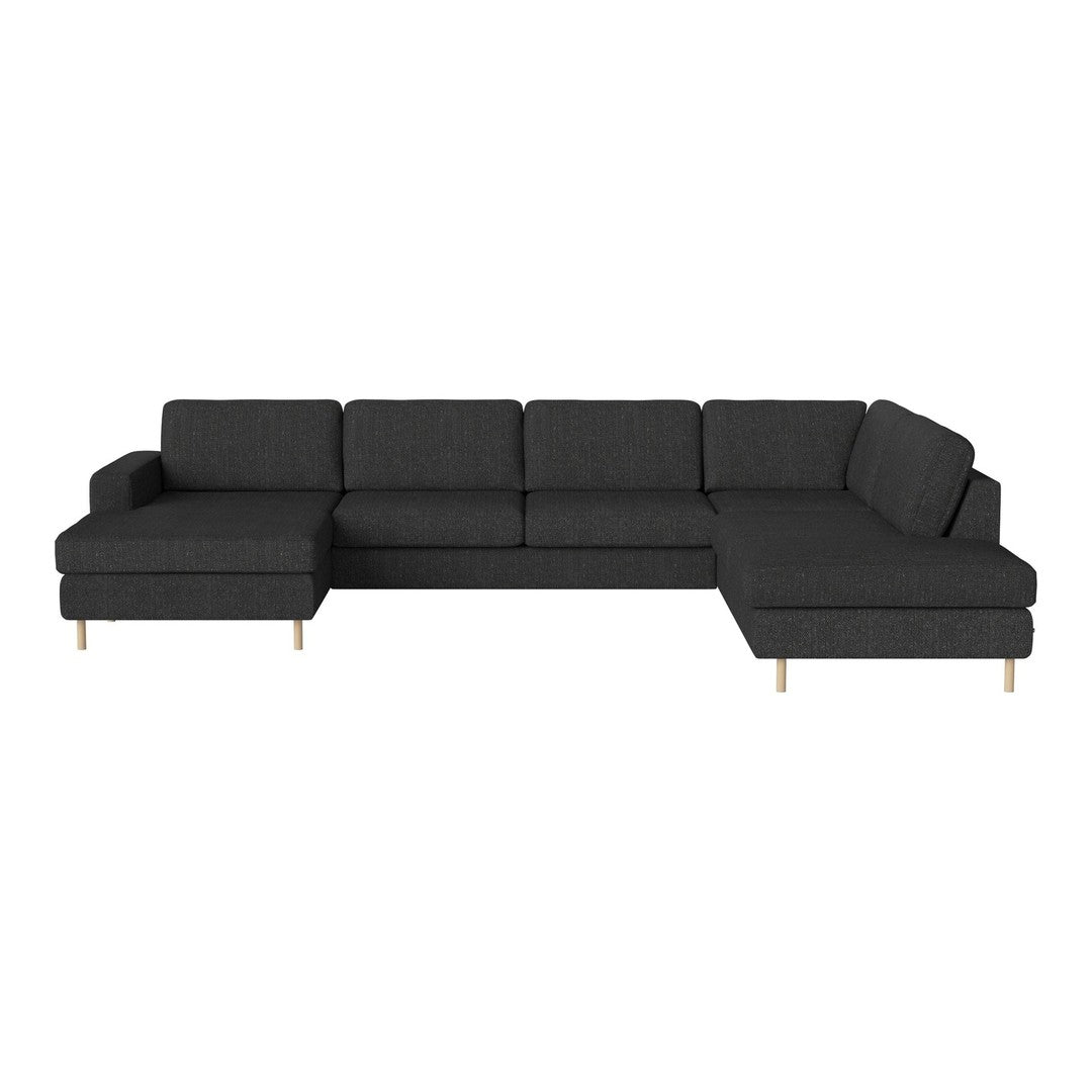 Dark gray sectional sofa with a modern design and smooth fabric, featuring clean lines and wooden legs.
