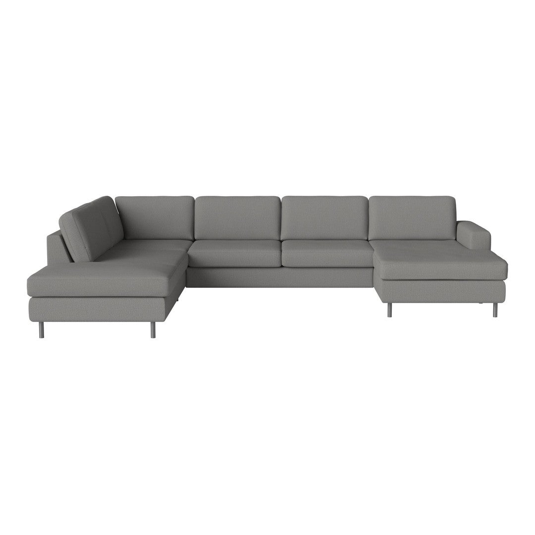 Gray sectional sofa with clean lines and a modern, minimalist design. Soft fabric upholstery complements any decor.