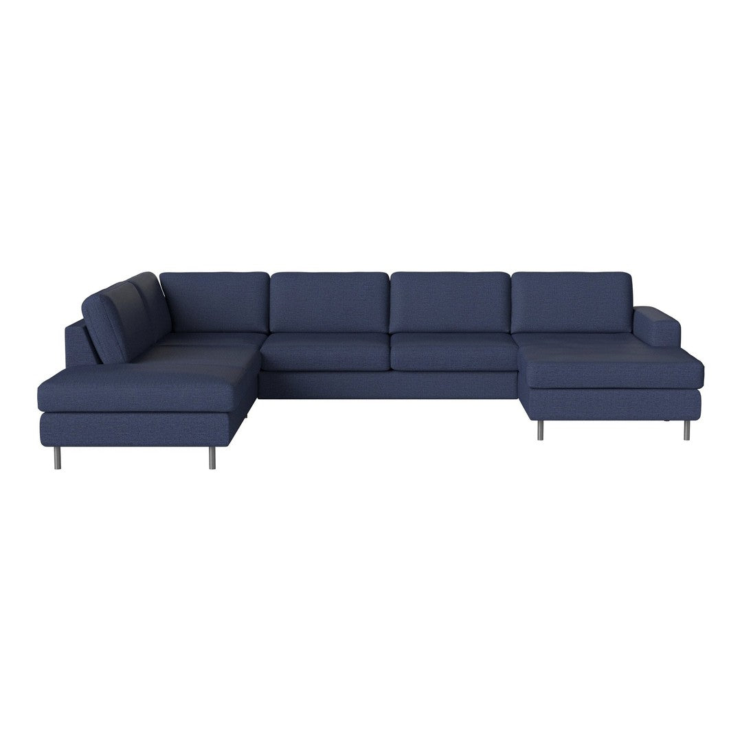 Navy blue sectional sofa with a modern design, featuring seamless upholstery and no visible patterns.
