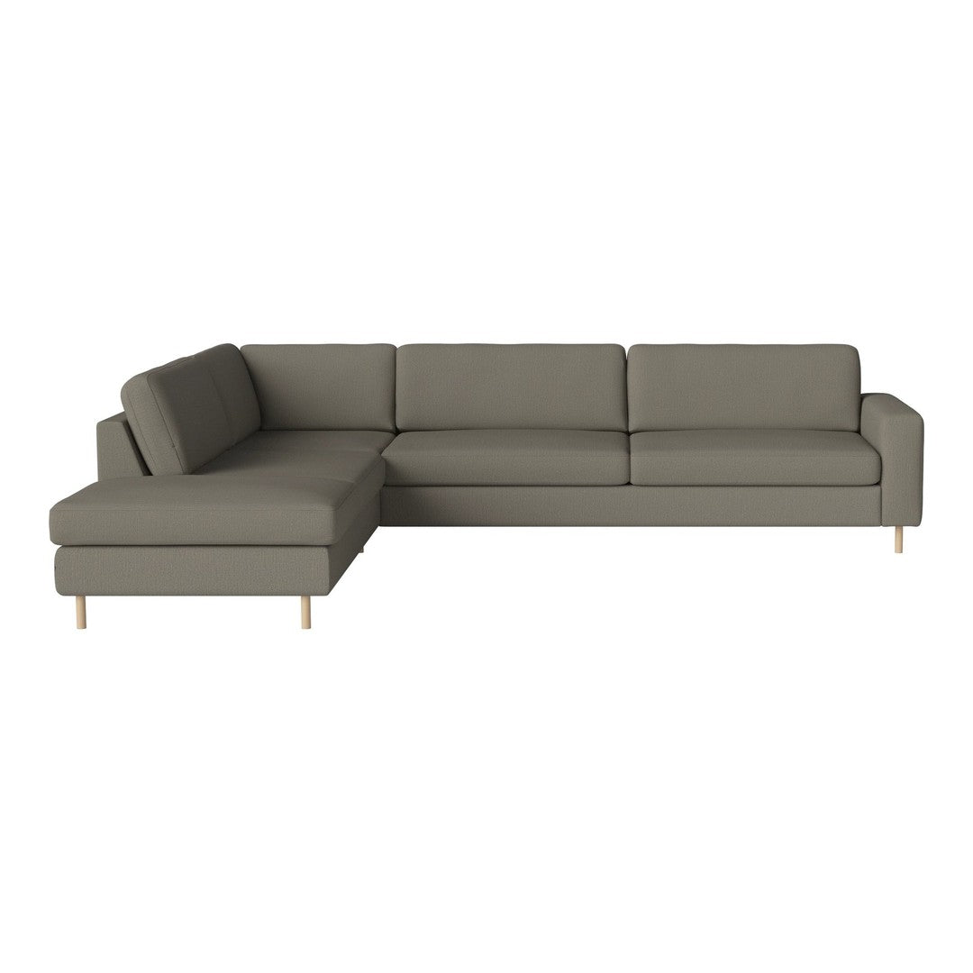 Modern gray sectional sofa with clean lines and subtle texture, featuring light wooden legs. Ideal for contemporary spaces.