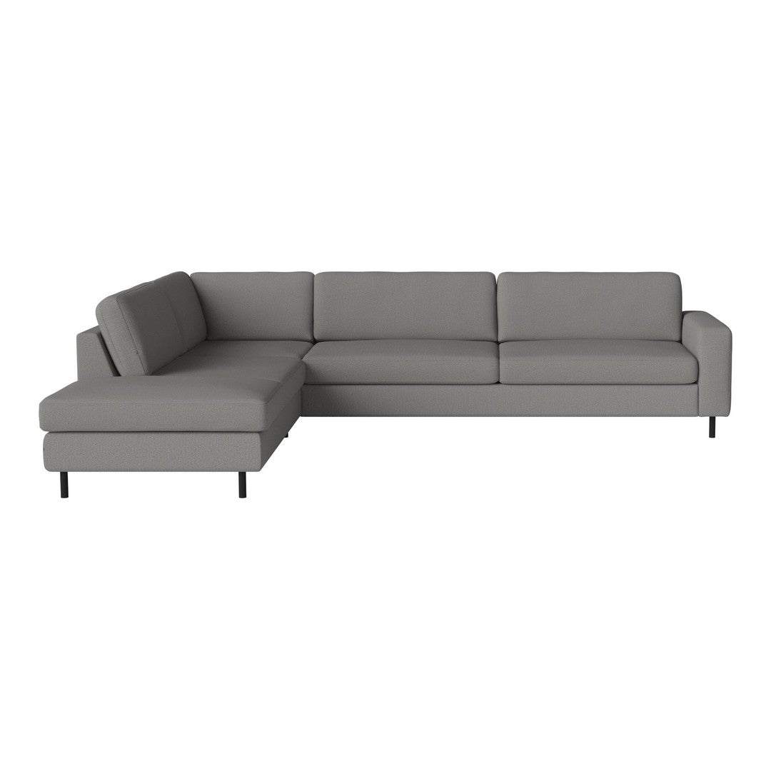 Gray sectional sofa with clean lines and modern design, featuring a solid upholstery pattern. Ideal for contemporary spaces.
