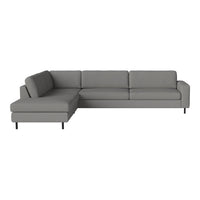 Gray sectional sofa with clean lines and minimalistic design, featuring solid upholstery and sleek black legs.