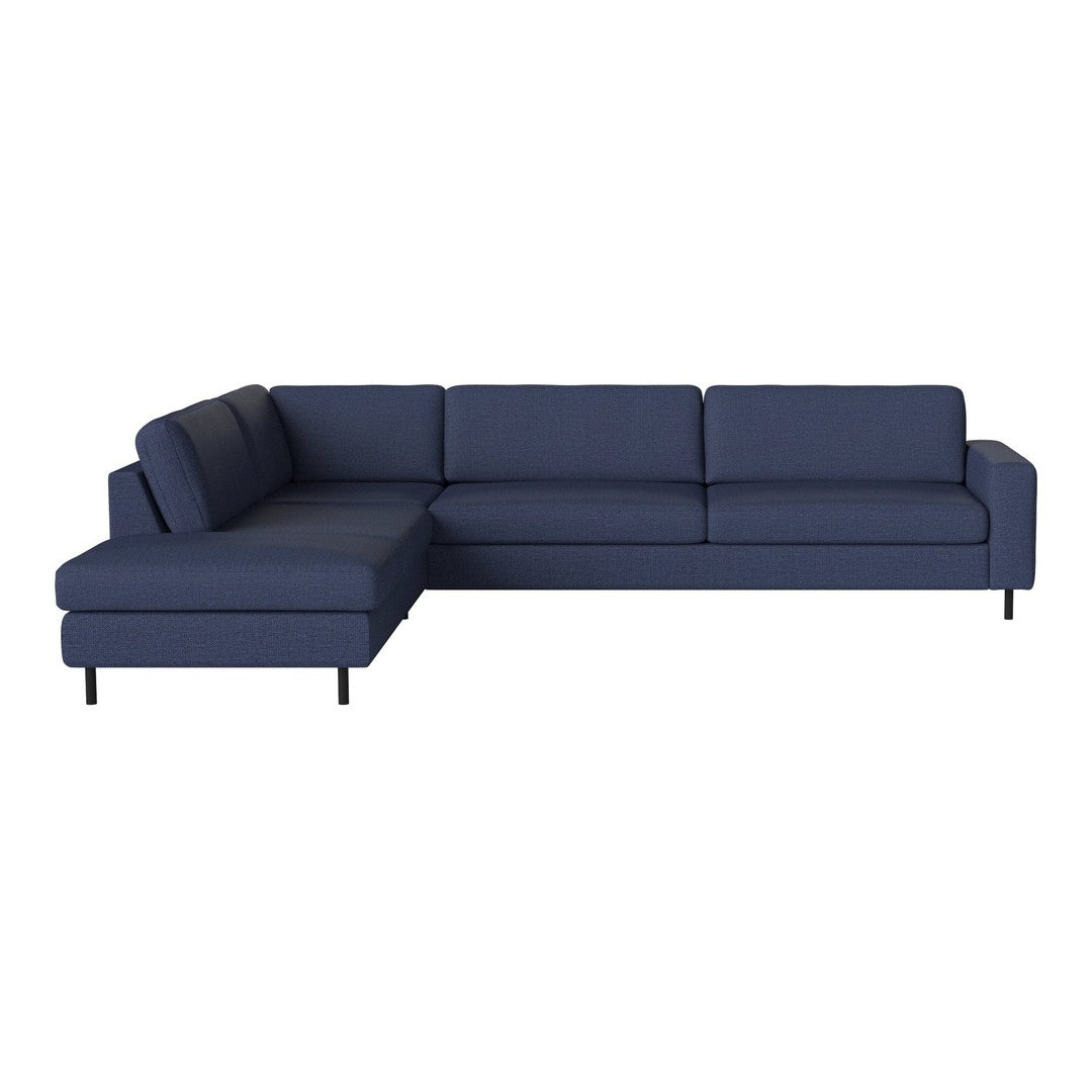 Navy blue sectional sofa with clean lines and smooth fabric design, ideal for modern living spaces.