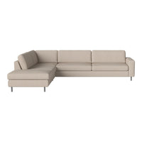 Light beige sectional sofa with smooth, solid fabric and minimalist design. Perfect for modern interiors.