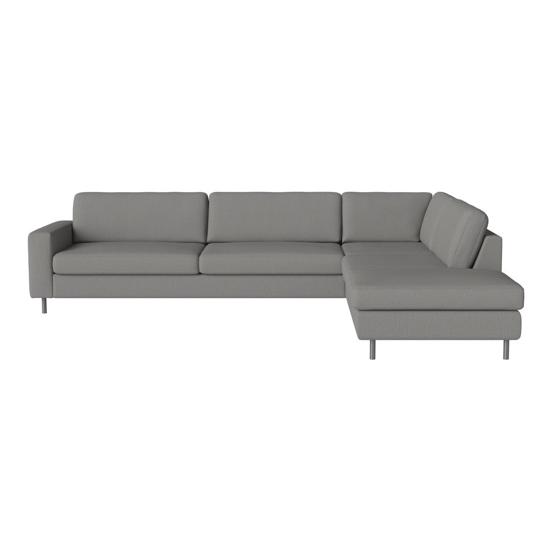 Gray sectional sofa with sleek lines and minimalist design. Perfect for modern living rooms.