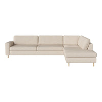 Beige sectional sofa with a smooth, minimalist design and light wooden legs, perfect for modern living spaces.