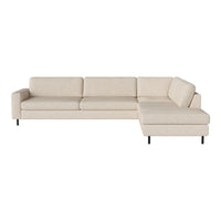 Beige sectional sofa with a smooth texture and minimalist design, featuring clean lines and black metal legs.