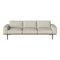 Light beige three-seater sofa with a sleek, minimalist design and smooth upholstery. Perfect for modern decor.