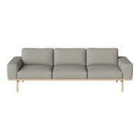 Light gray fabric sofa with a minimalist design, featuring a smooth texture and wooden legs. Perfect for modern decor.