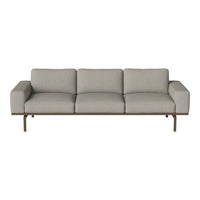 Gray three-seater sofa with solid cushions and sleek wood frame, featuring a minimalist design.