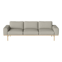 Light gray three-seater sofa with a smooth fabric texture and a minimalist wooden frame. Perfect for modern decor.