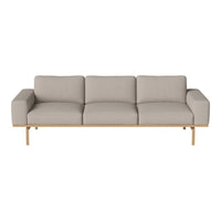 Light gray three-seater sofa with a minimalist design and wooden legs, featuring smooth, textured upholstery.
