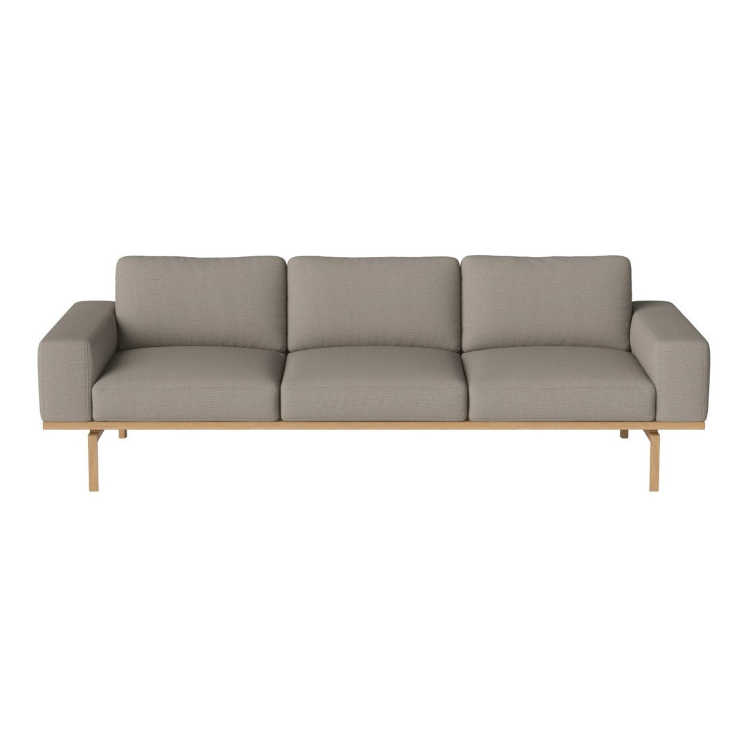 Gray upholstered sofa with a sleek design and natural wood legs, featuring clean lines and minimalistic style.
