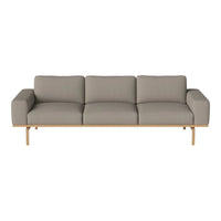 Gray upholstered sofa with a sleek design and natural wood legs, featuring clean lines and minimalistic style.