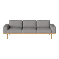 Gray upholstered sofa with a sleek, minimalistic design and light wood legs. Perfect for modern interiors.