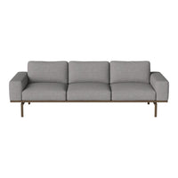 Gray upholstered sofa with a modern, minimalist design and smooth fabric texture. Suitable for contemporary interiors.
