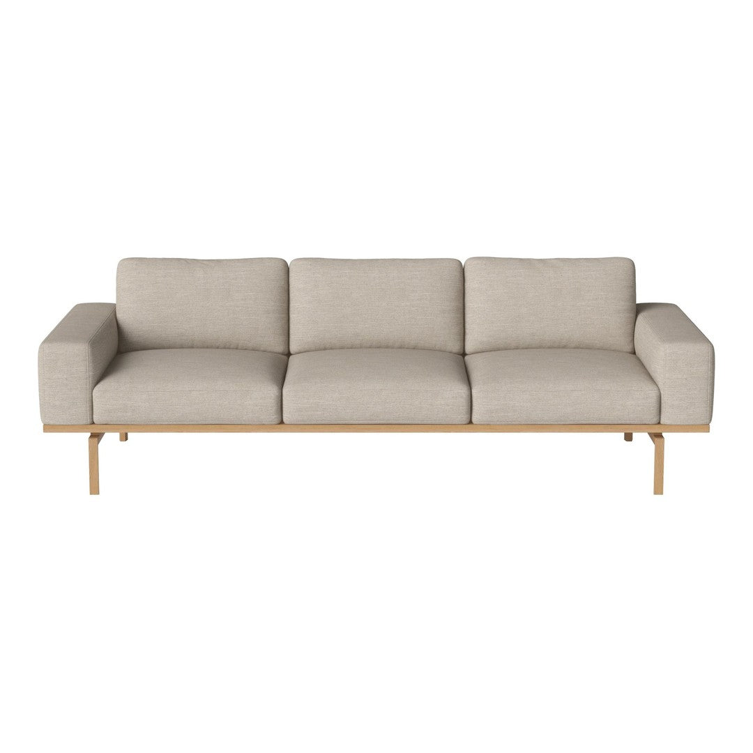 Light beige three-seater sofa with a smooth, textured fabric and wooden legs, perfect for modern living rooms.