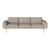 Light gray three-seater sofa with clean lines and a minimalist design, featuring wooden legs and no patterns.