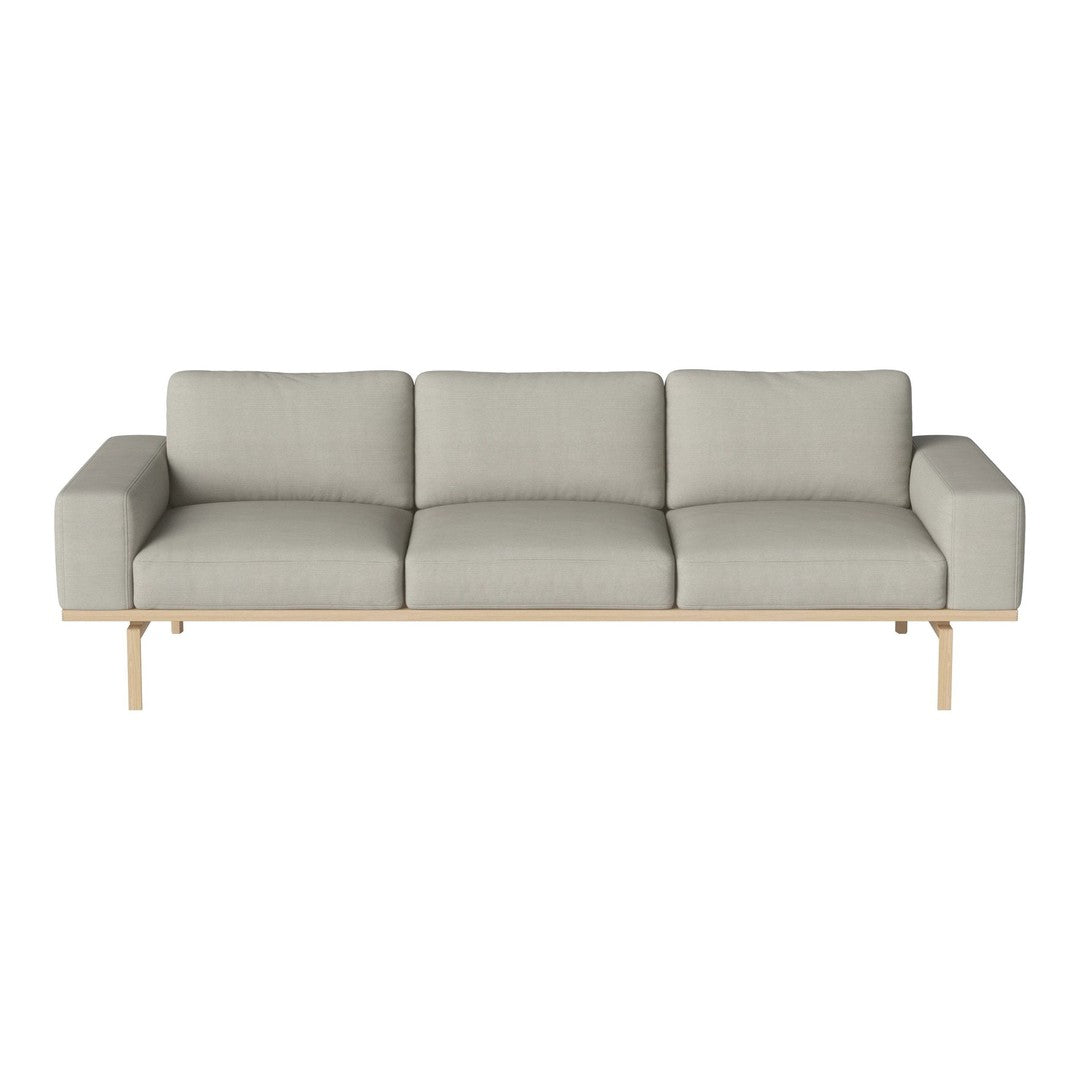 Light gray fabric sofa with clean lines and a minimalist design, featuring a natural wood frame. Ideal for modern decor.