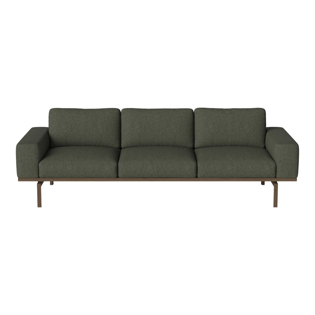 Modern dark green fabric sofa with sleek, minimalist design and sturdy metal legs. Perfect for contemporary interiors.