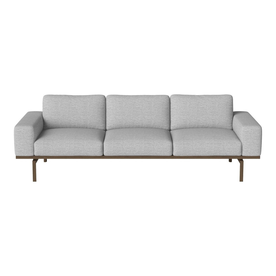 Light gray three-seater sofa with smooth upholstery and minimalist design, featuring a sleek wooden frame.