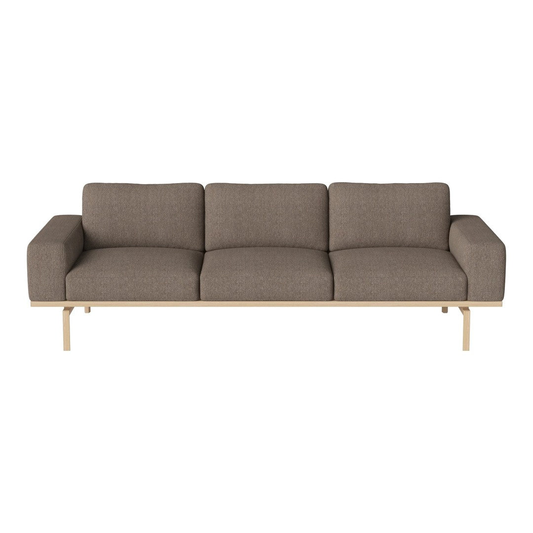 Modern gray sofa with three plush cushions and a sleek wooden frame, perfect for minimalist decor.