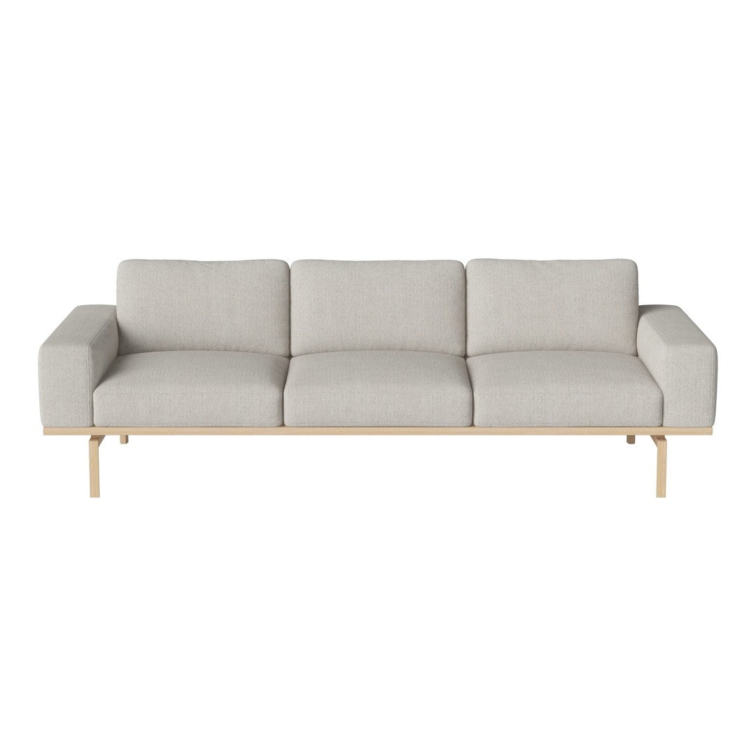 Light gray modern sofa with clean lines and plush cushions, featuring a minimalist design and natural wood legs.