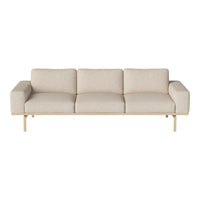 Light beige sofa with a minimalist design, featuring smooth fabric and a natural wood base.