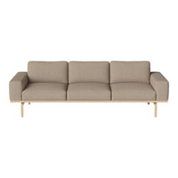 Beige upholstered sofa with smooth fabric and natural wood legs, featuring a minimalist design and clean lines.