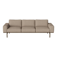Beige three-seater sofa with a textured fabric and sleek metal legs, ideal for modern home decor.