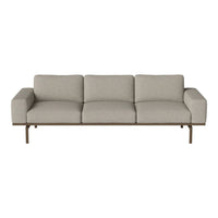 Light gray fabric sofa with clean lines and a minimalist design, featuring three cushions and a sleek metal frame.