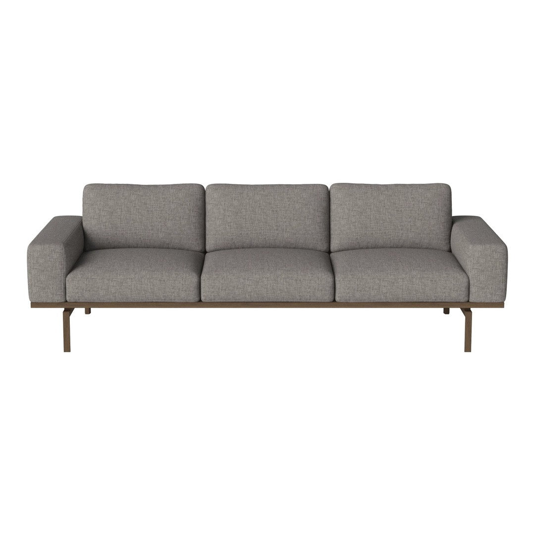 Gray upholstered sofa with a sleek design and subtle texture, featuring a modern metal frame. Ideal for contemporary decor.