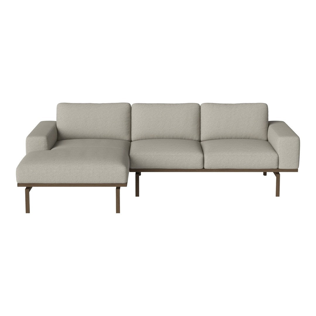 Light grey sectional sofa with a modern design and minimalistic patterns, featuring a sleek metal frame.