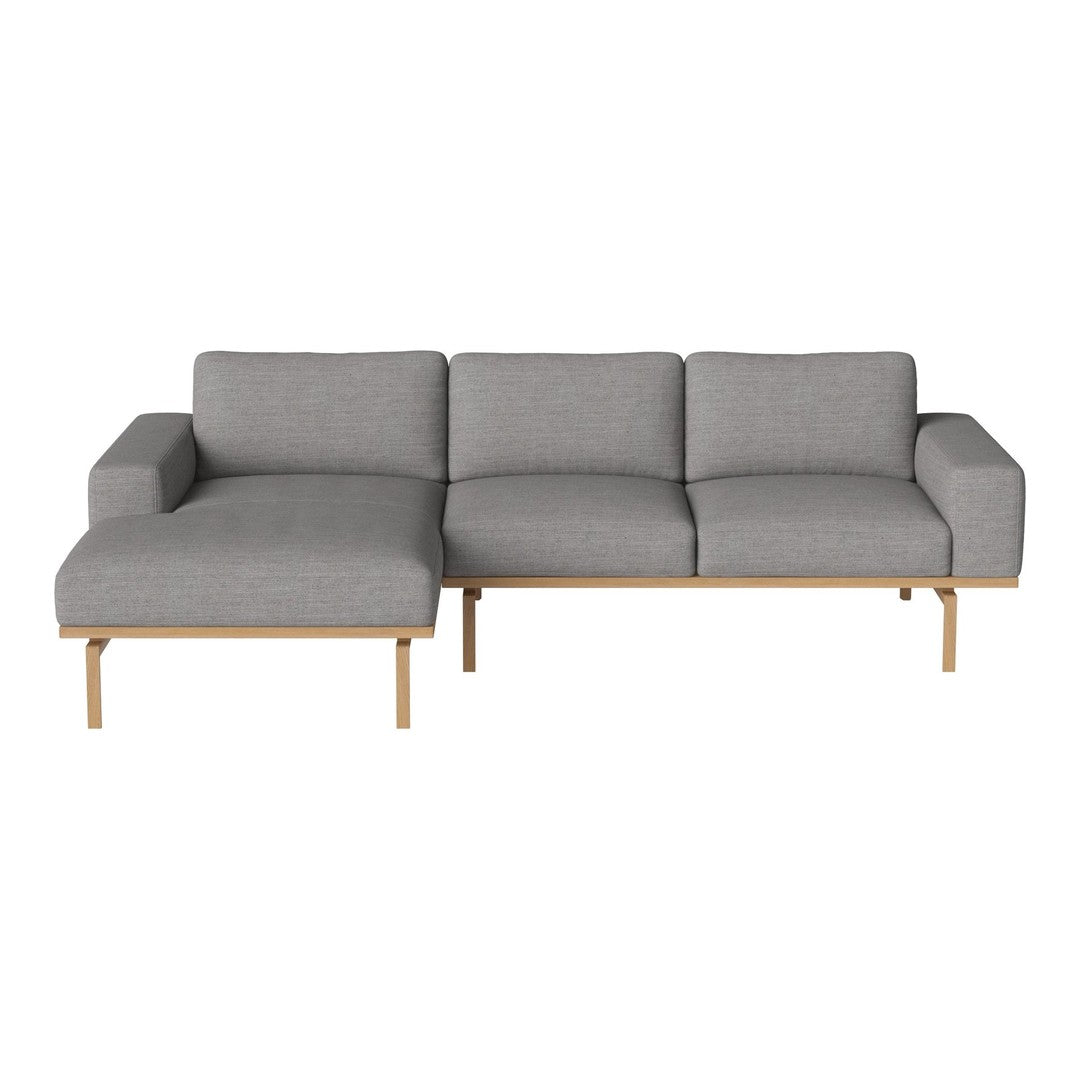 Gray fabric sectional sofa with a minimalist design and natural wood legs. Modern, sleek, and versatile style.