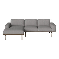 Modern gray sectional sofa with a sleek design and subtle texture, featuring clean lines and a minimalist style.