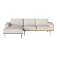 Modern beige sectional sofa with clean lines and natural wood accents. Perfect for minimalist decor.