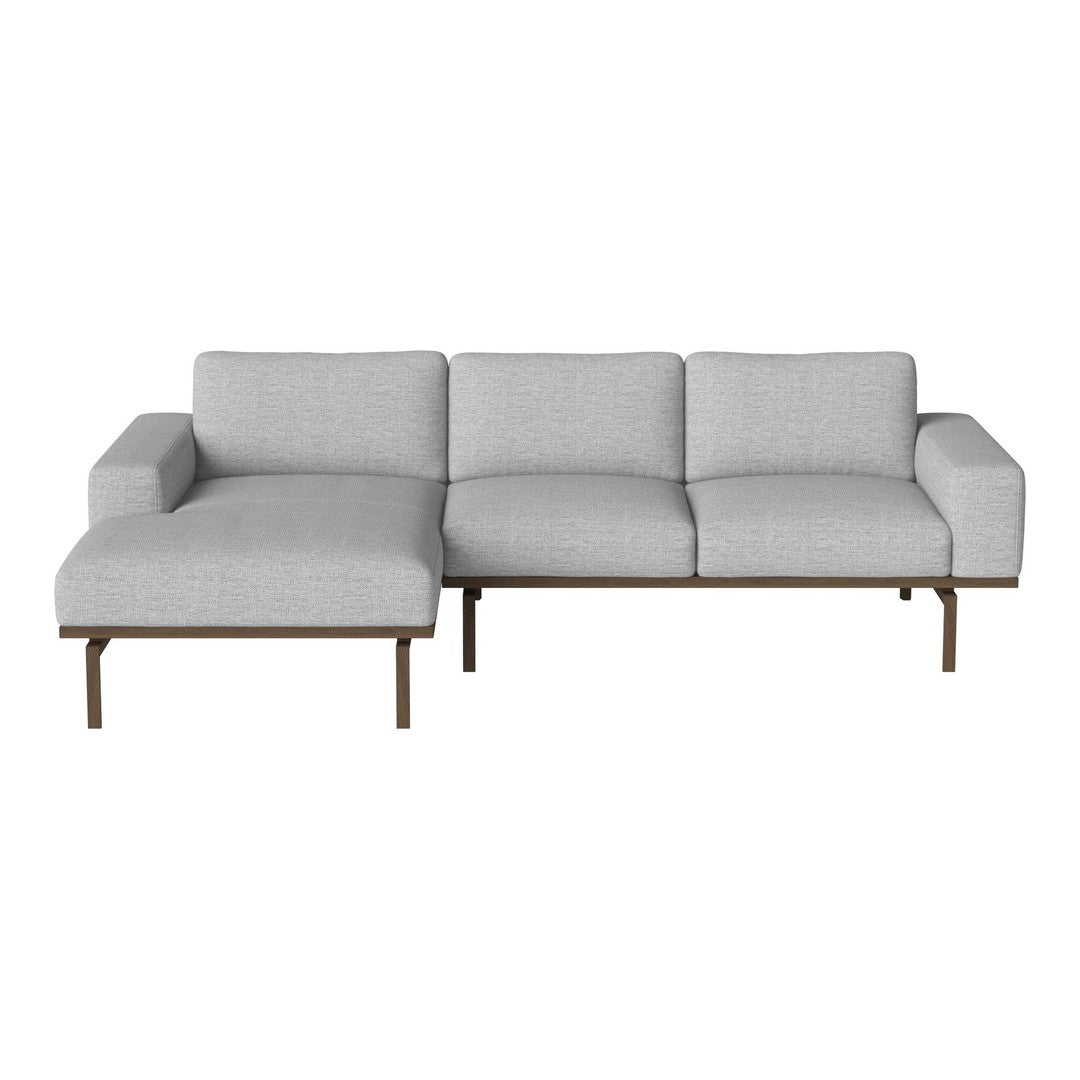 Light gray fabric sectional sofa with modern minimalistic design and sleek wooden legs. Perfect for contemporary decor.