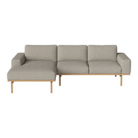 Modern gray sectional sofa with clean lines and minimalistic wooden legs, perfect for contemporary interiors.