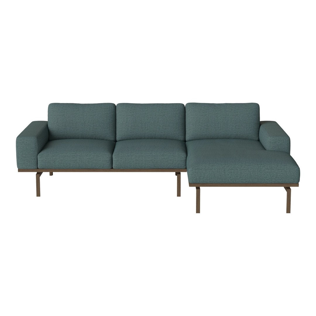 Teal sofa with a clean, minimalist design and subtle textured pattern, featuring a sleek metal frame.